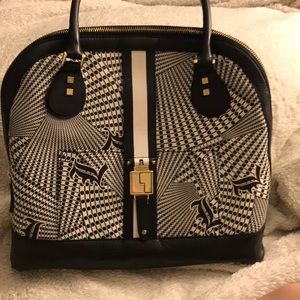 LAMB Handbag. Great design! Holds a lot!